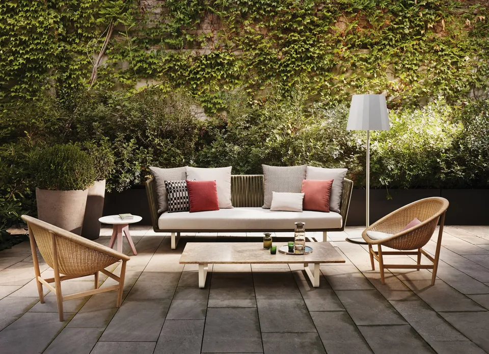 Kettal Basket outdoor furniture in use, catalog photograph