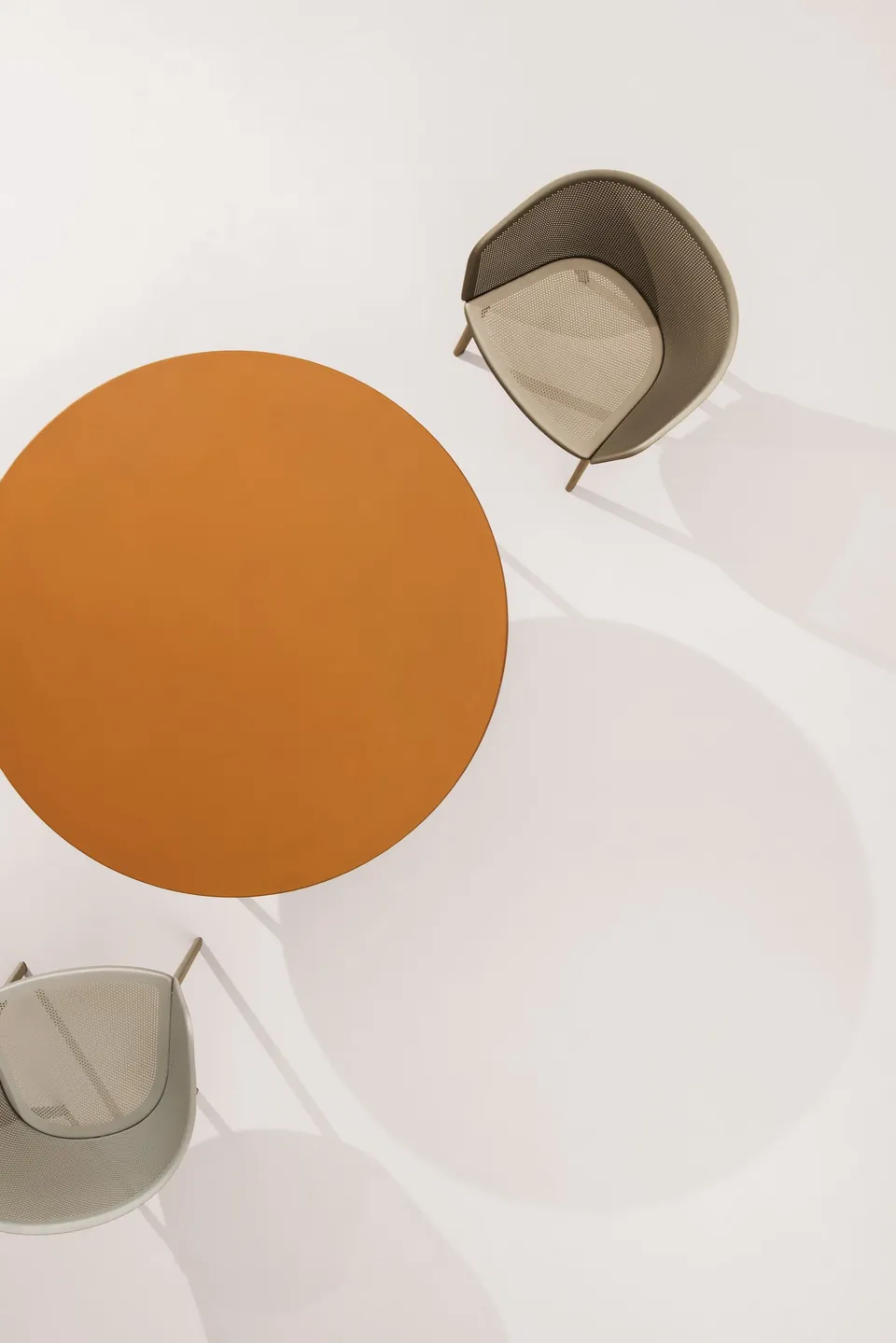 Kettal Stampa outdoor furniture in use, catalog photograph